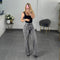 PANTALON MOM GRIS CON CRISTALES VIBRANT